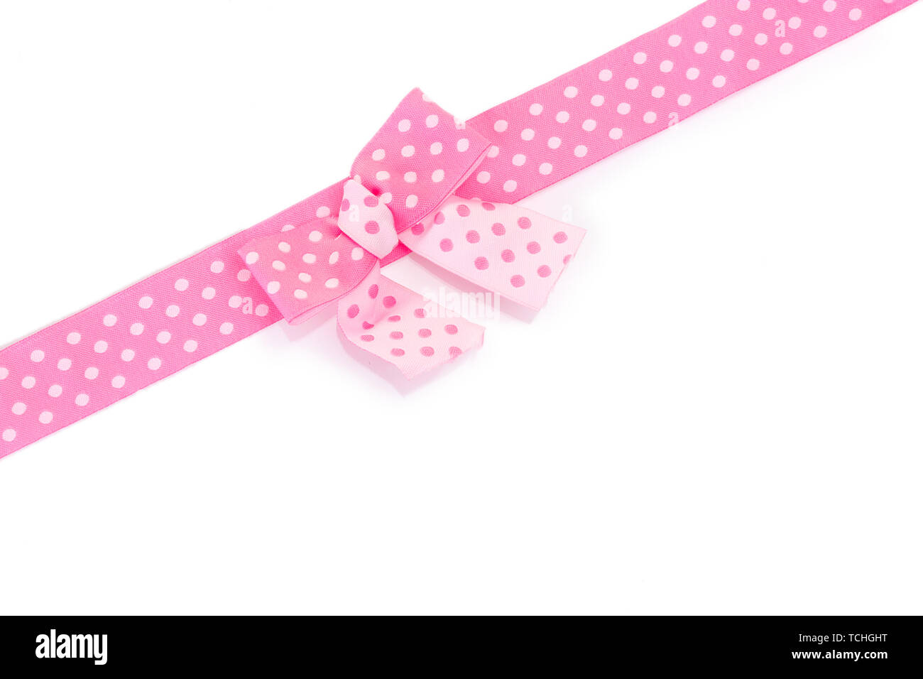 beautiful pink bow and ribbon isolated on white Stock Photo - Alamy