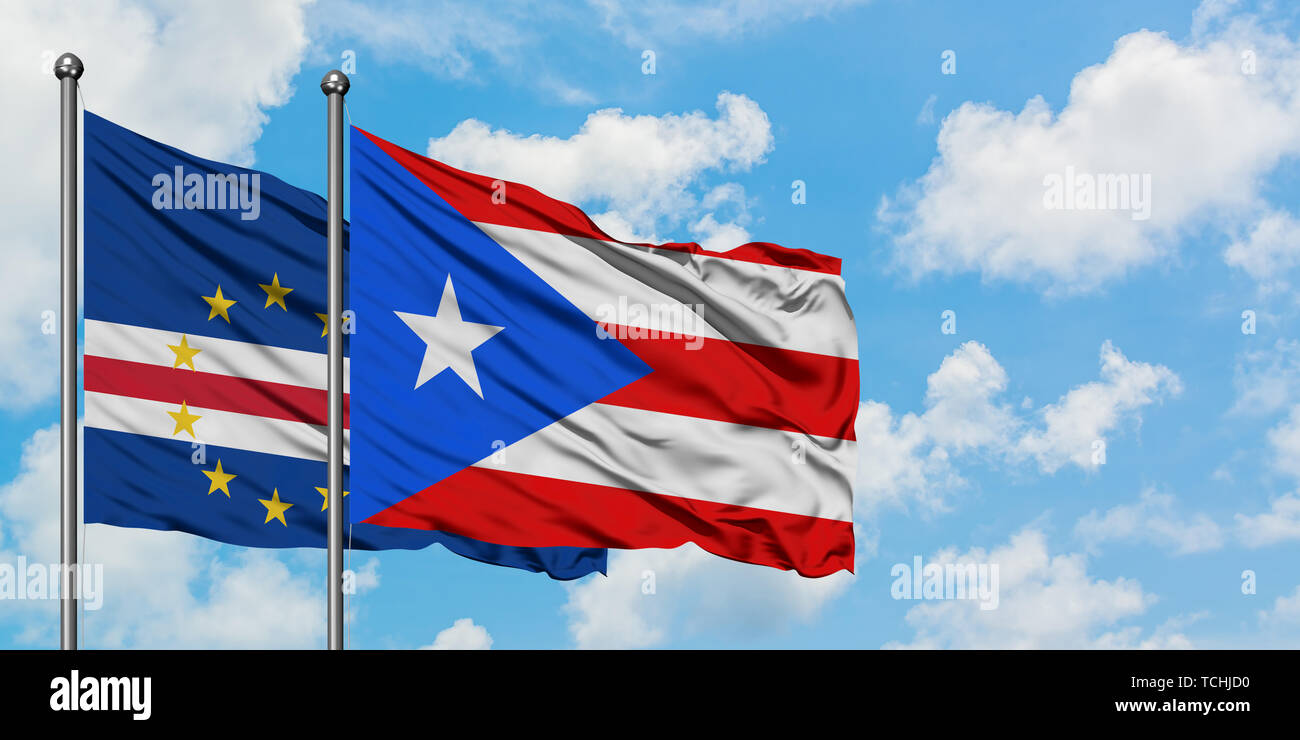 Cape Verde And Puerto Rico Flag Waving In The Wind Against White