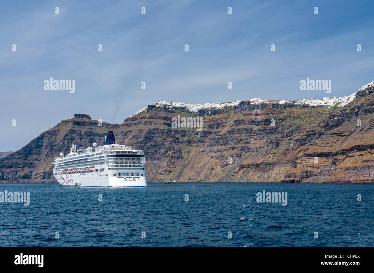 Norwegian Star cruise ship at Santorini Stock Photo