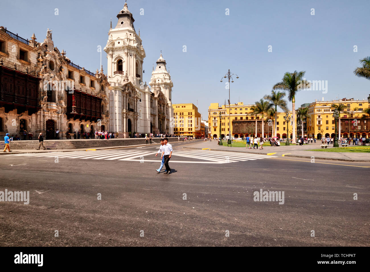 Lima, Peru - April 22, 2018: View of main square and Cathedral on sunny morning with many tourists Stock Photo