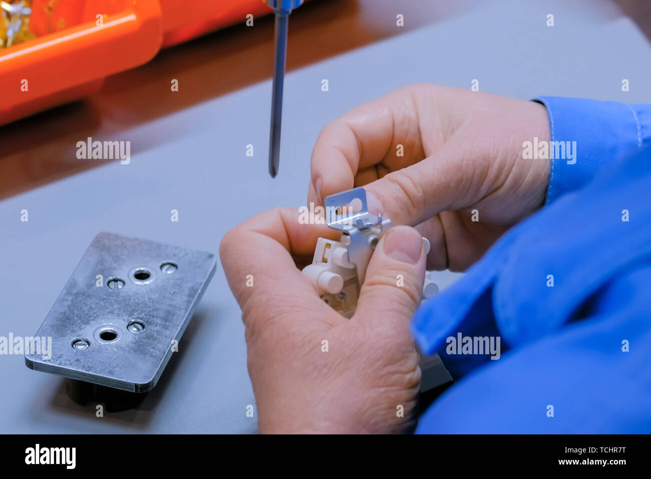 Electric socket handmade manufacturing process Stock Photo Alamy