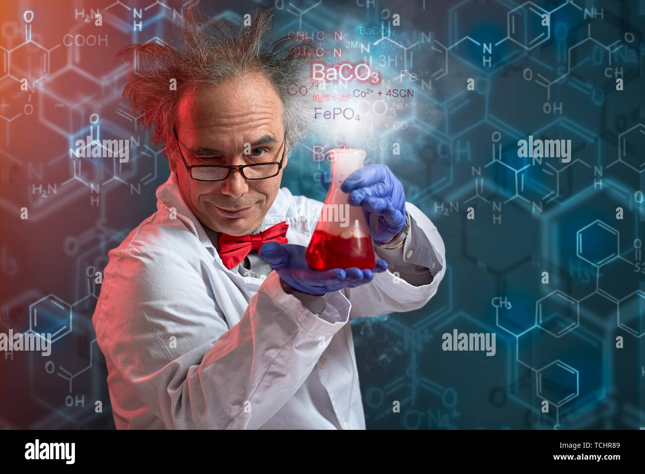 crazy chemistry showing his succeed product of experiment Stock Photo Alamy