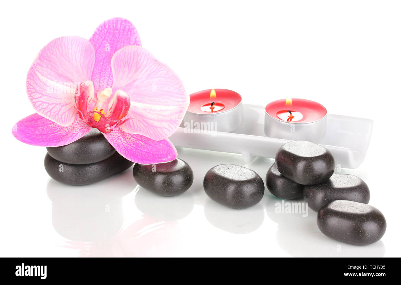 Spa stones with orchid flower and candles isolated on white Stock Photo ...