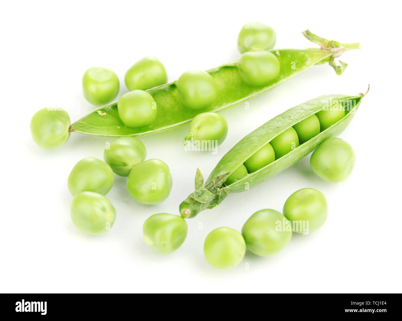 Green peas isolated on white Stock Photo - Alamy