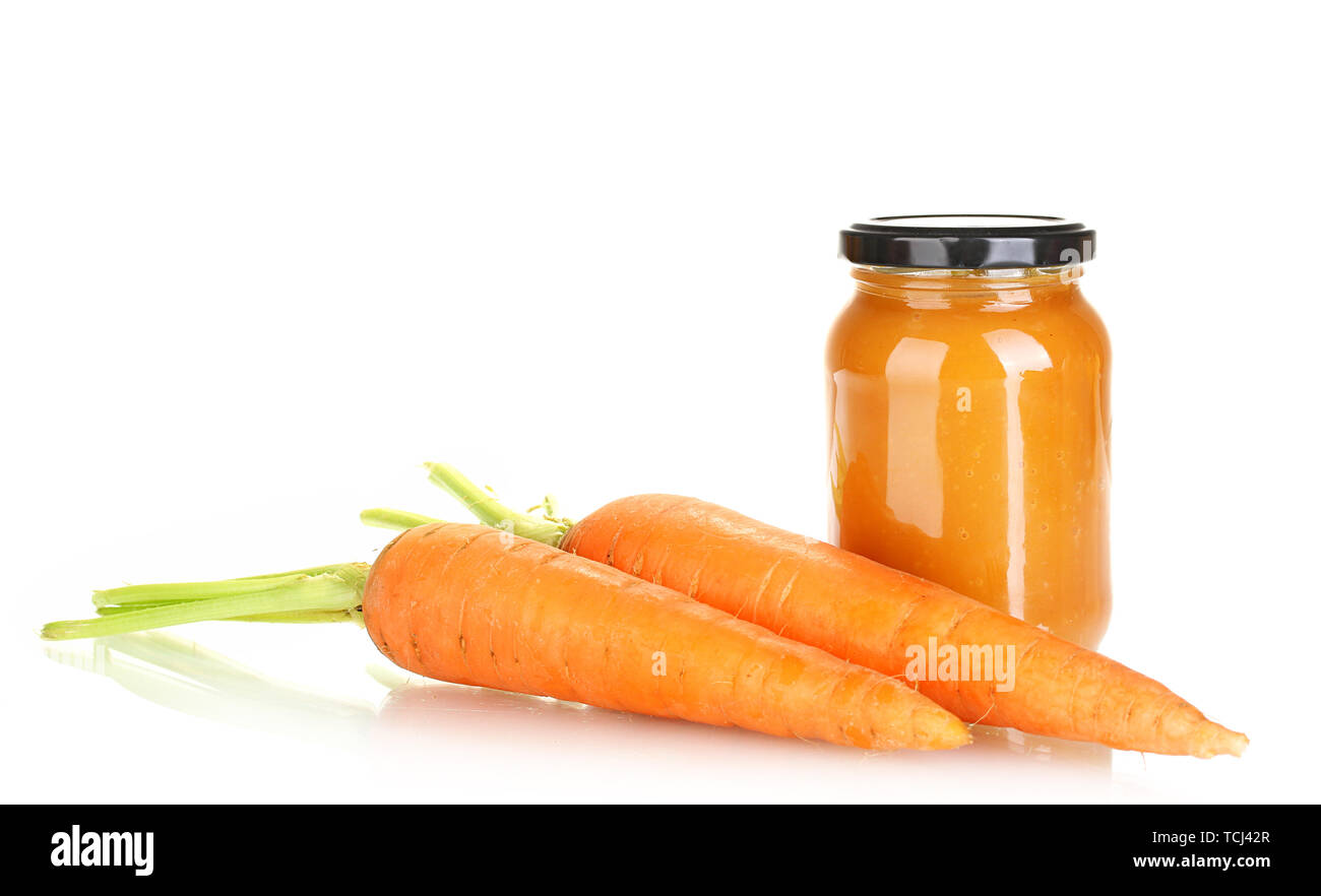 Jar with carrot baby food isolated on white Stock Photo Alamy
