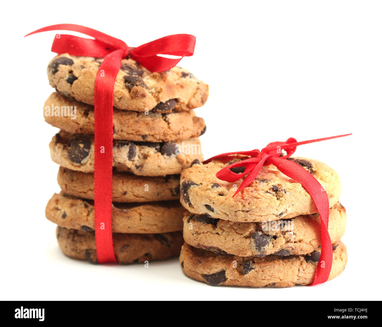 Chocolate chips cookies with red ribbons isolated on white Stock Photo ...