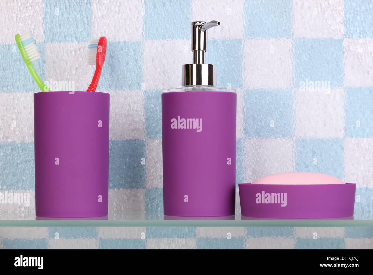 Bath accessories on shelf in bathroom Stock Photo Alamy