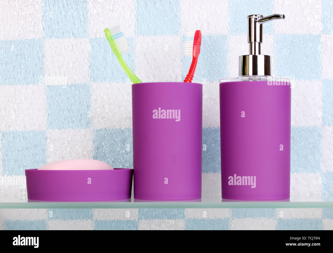 Bath accessories on shelf in bathroom Stock Photo Alamy