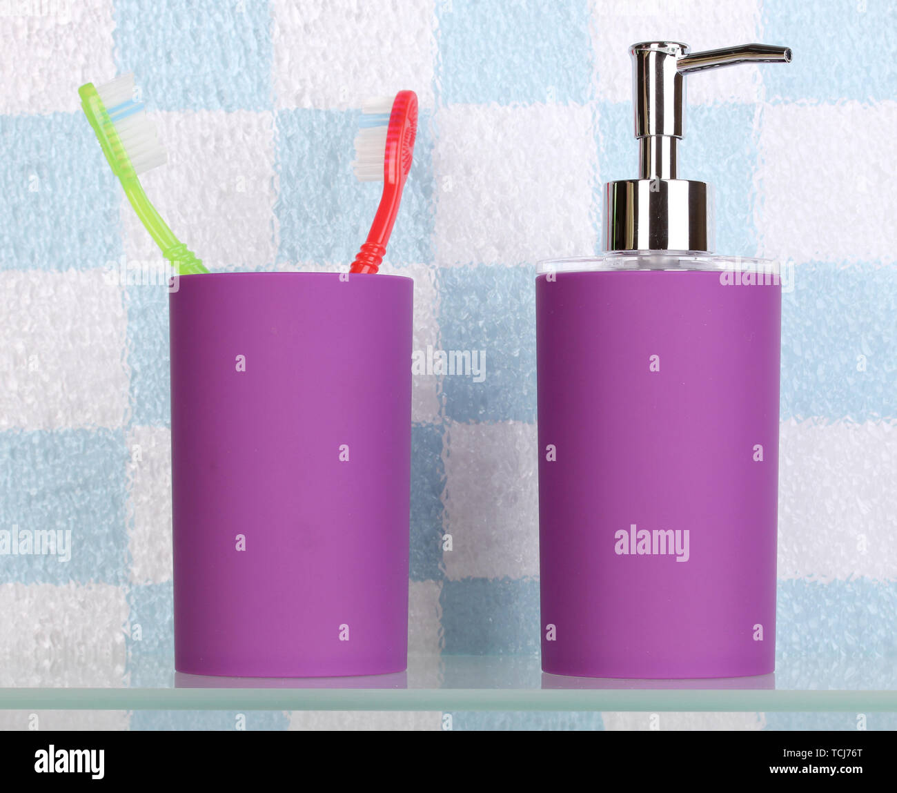Bath accessories on shelf in bathroom Stock Photo Alamy