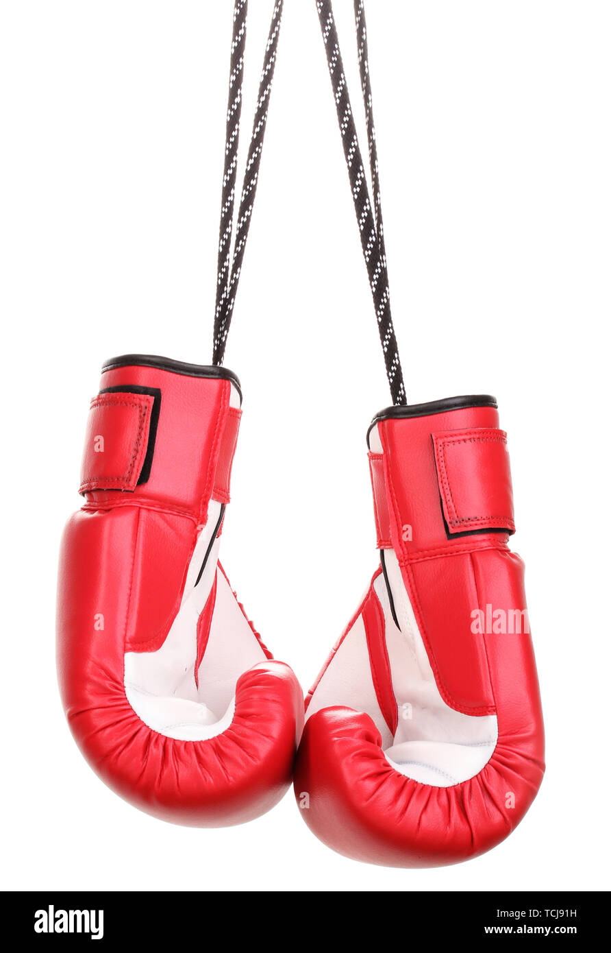 Red boxing gloves hanging isolated on white Stock Photo