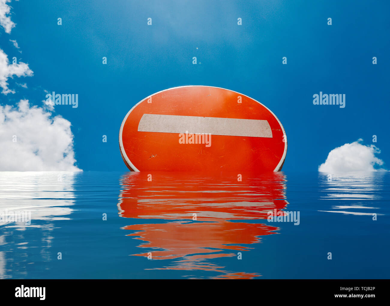 Flooded Universal Do Not Enter Sign, with copy space and blue sky