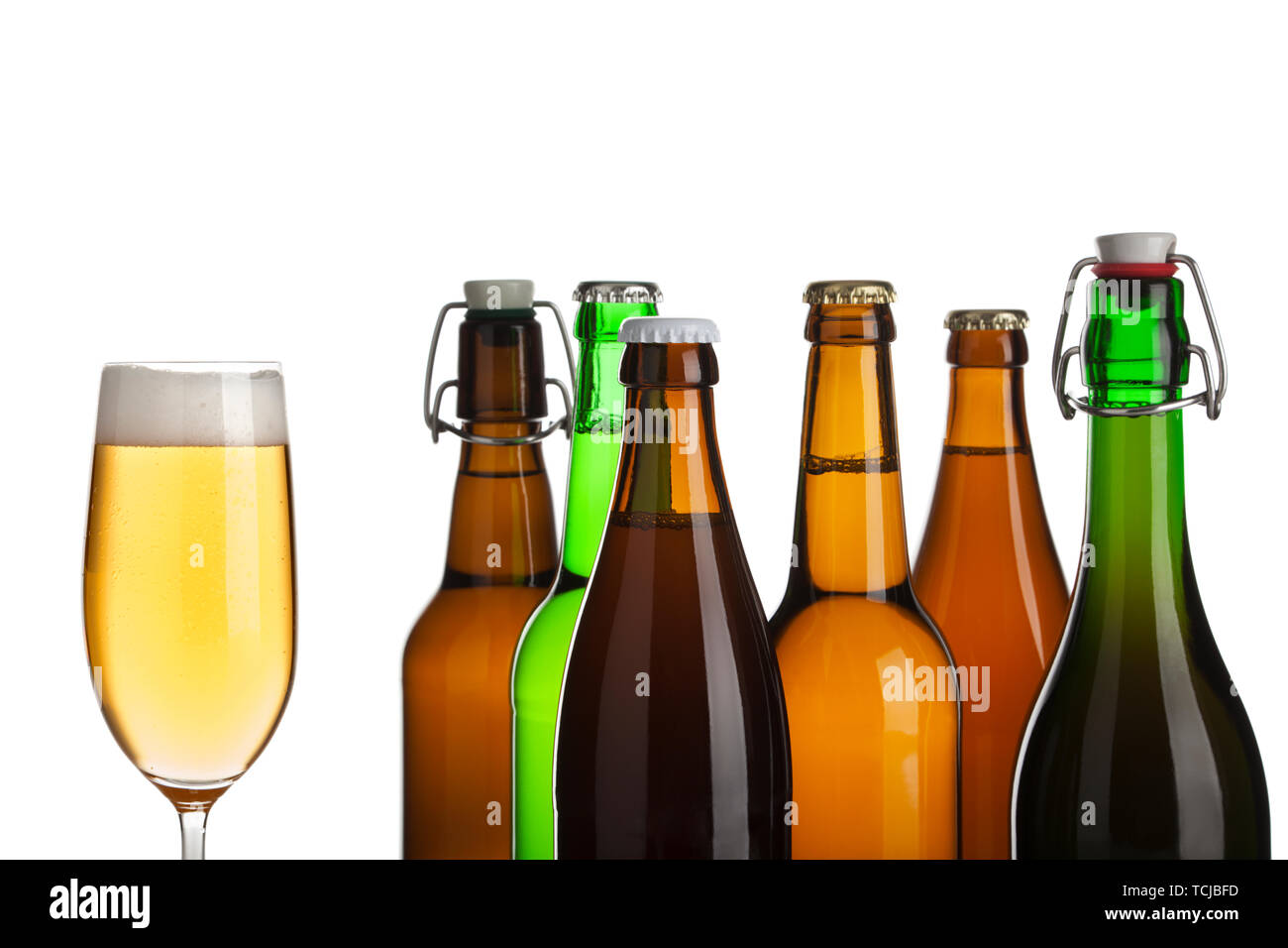 beer bottles and glass of pilsener beer isolated on white Stock Photo