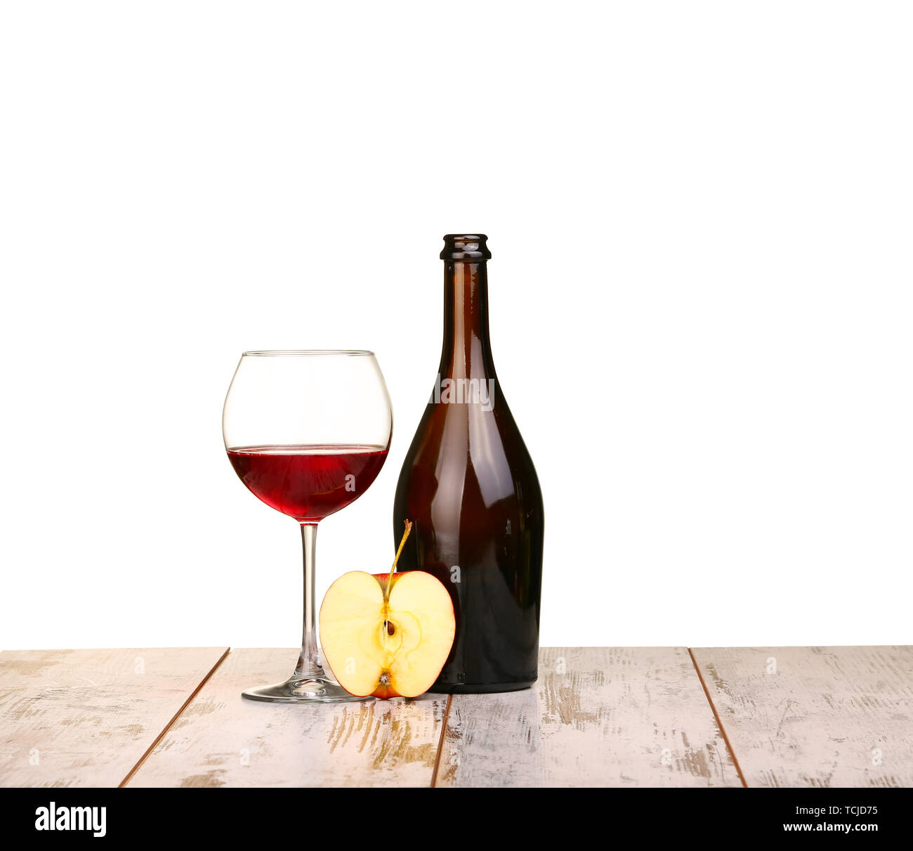 Glass Of Red Wine, A Bottle Of Wine And Grapes Apple On Board Isolated 