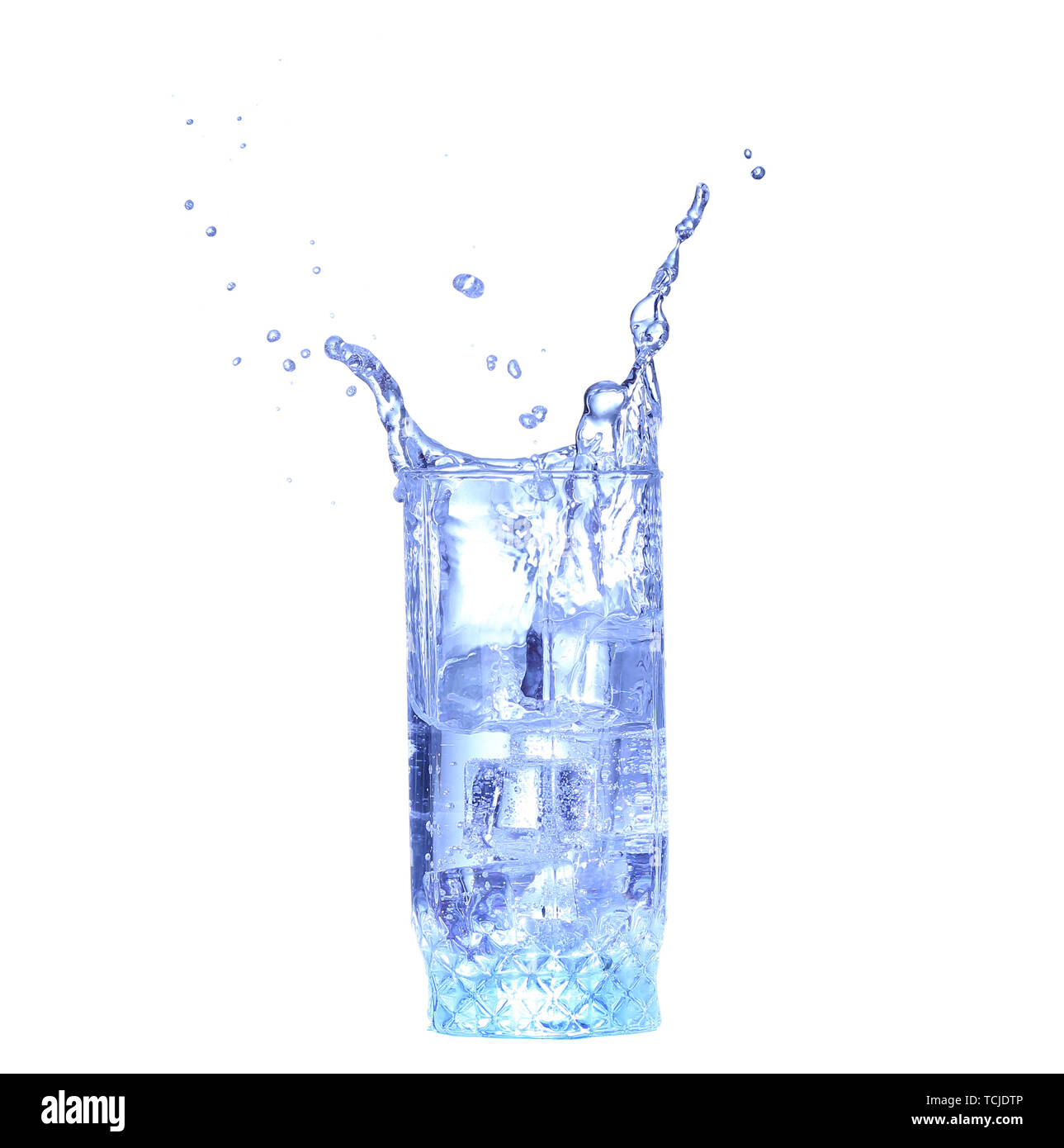 Glass of water, ice and slice of fresh lemon on a white background ...