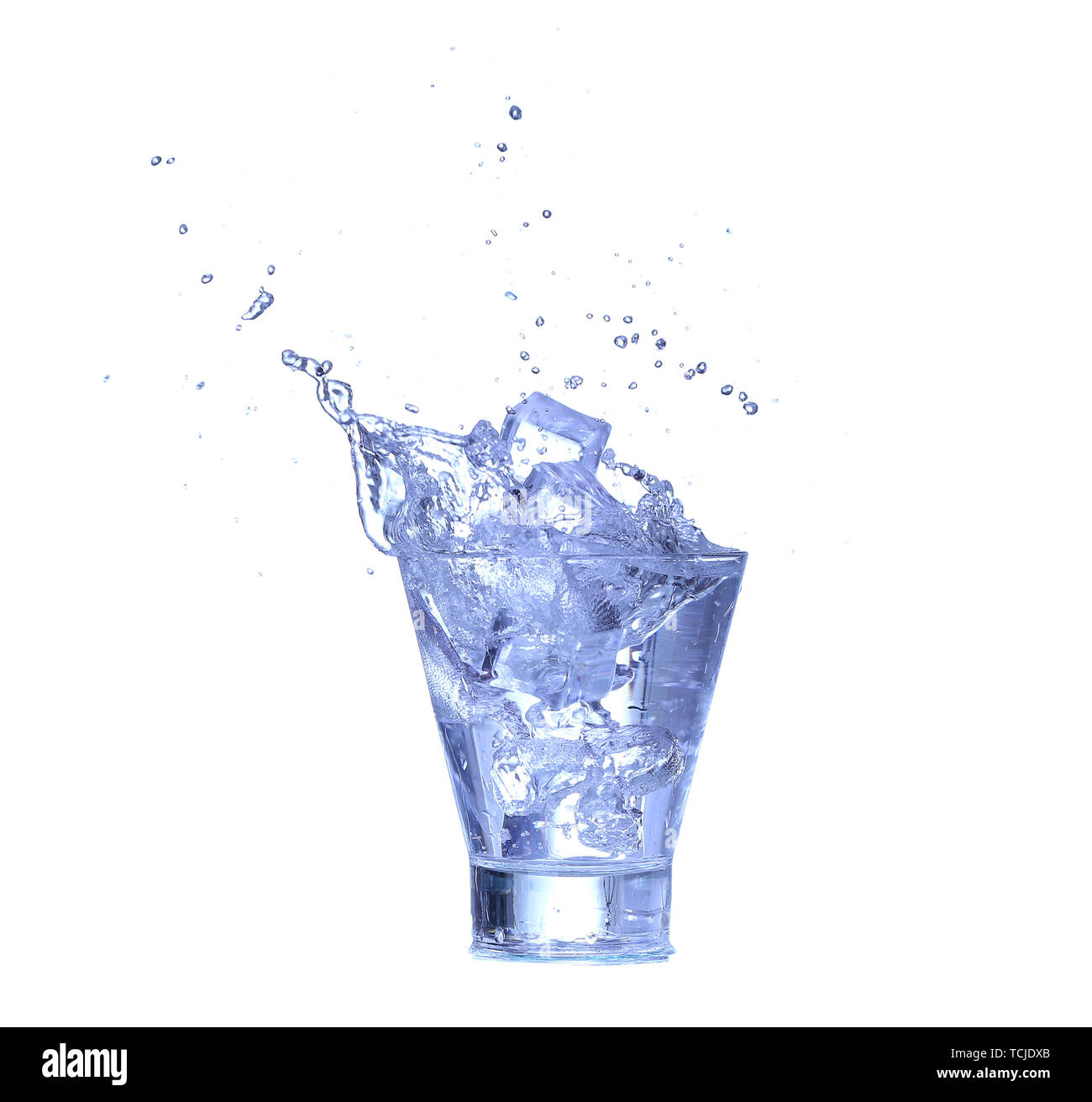 Glass of water, ice and slice of fresh lemon on a white background ...