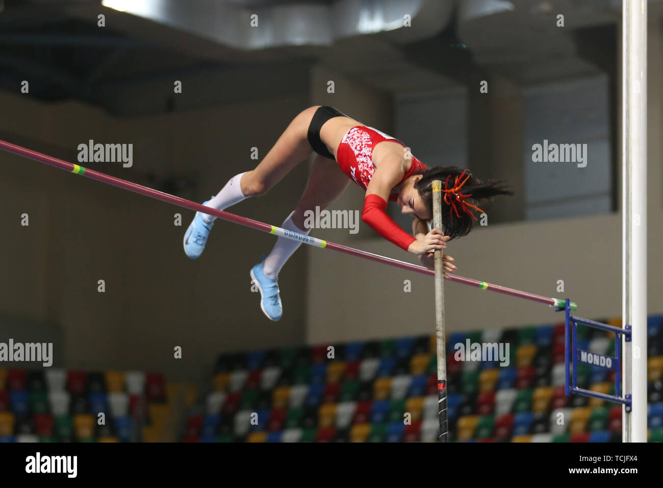 ISTANBUL, TURKEY - FEBRUARY 16, 2019: Undefined athlete pole vaulting during Balkan Athletics Indoor Championships Stock Photo