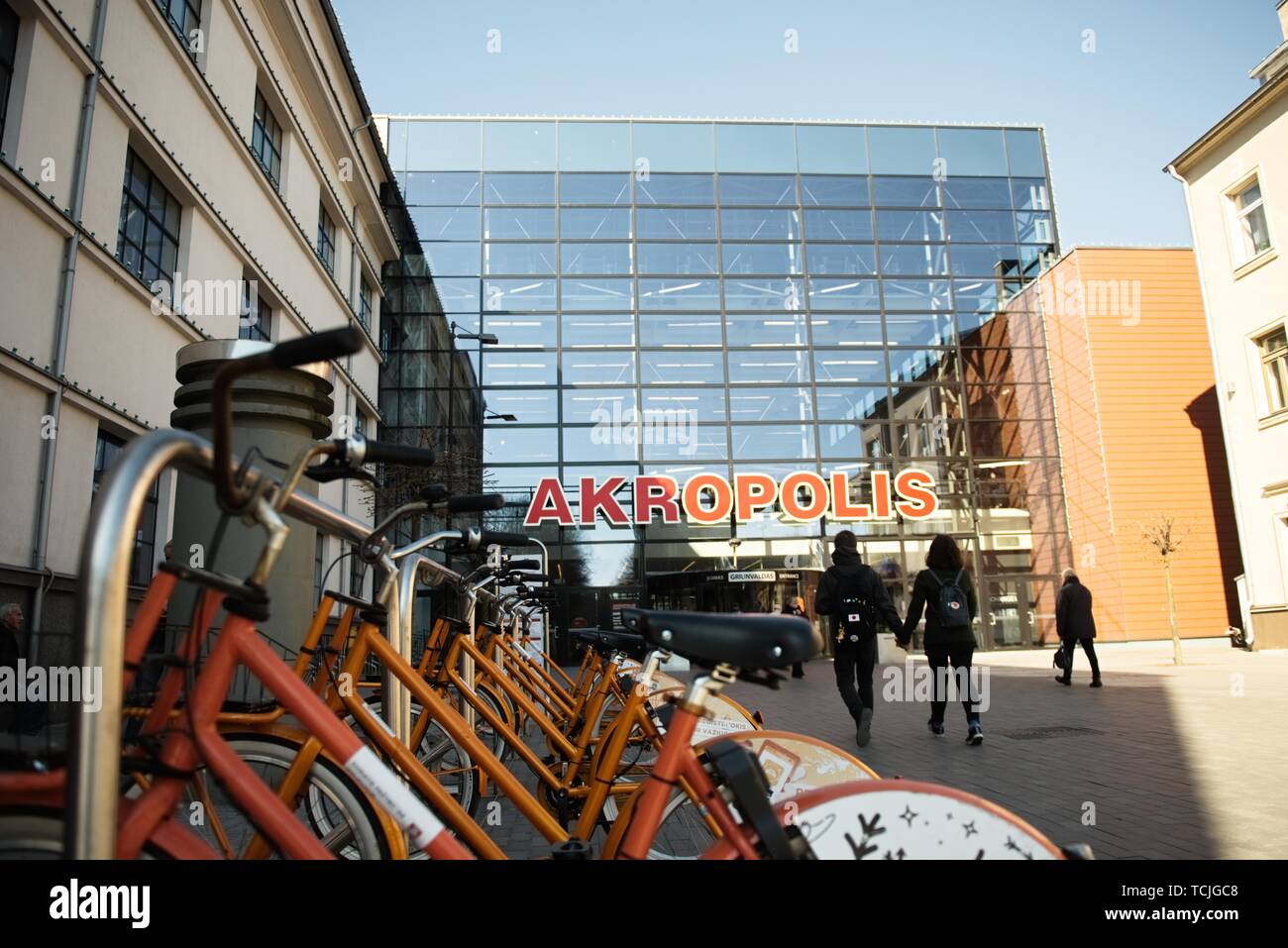Kaunas, Lithuania, May 19, 2016: Shared bikes are lined up in the streets of Kaunas. CityBee station next to shopping center Stock Photo
