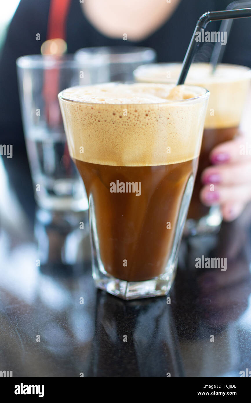 Traditional greek cold coffee Frappe with foam made from water, instant