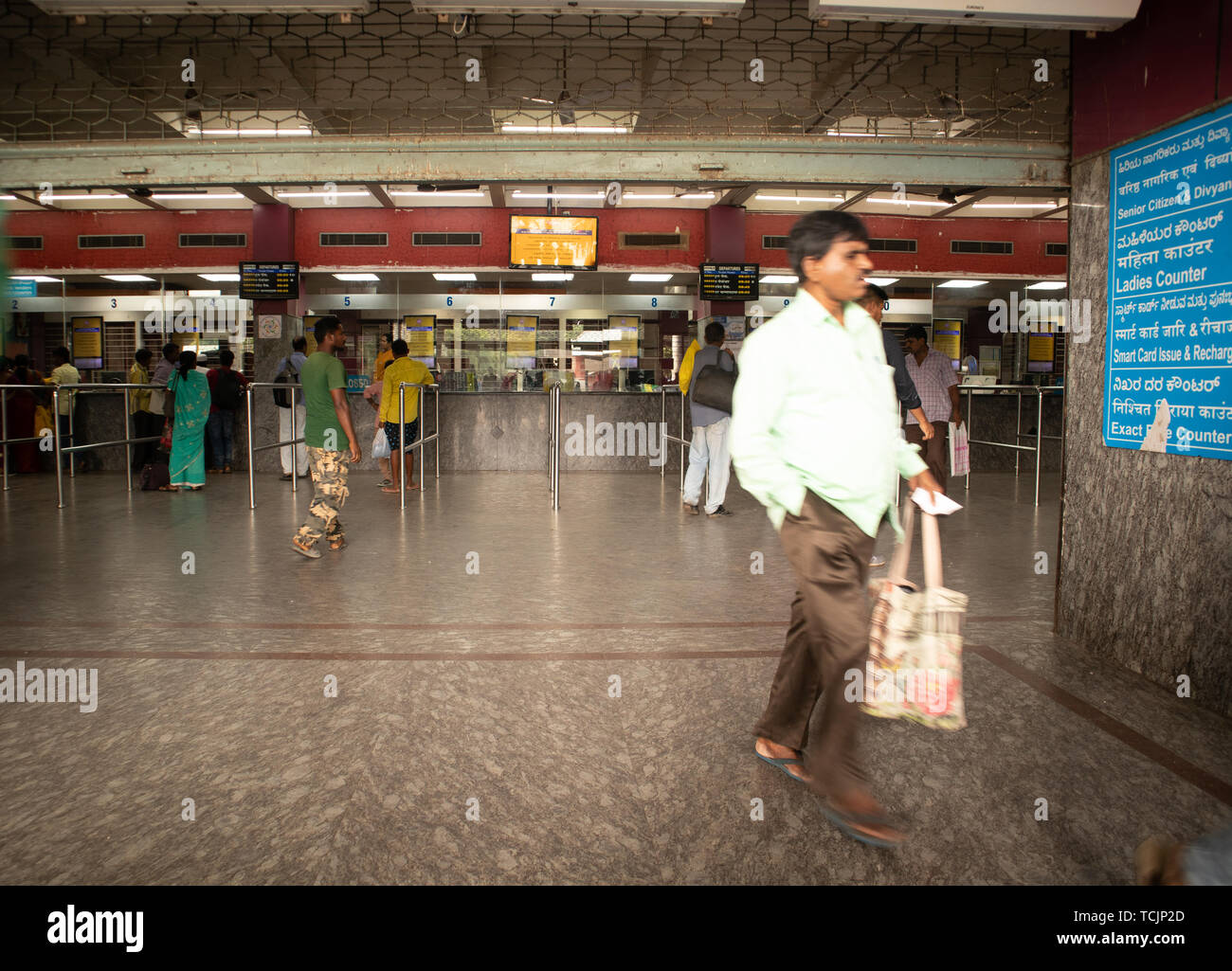 Bangalore India - June 3, 2019: Unidentified people queue to buy tickets at Bangalore railway station. Stock Photo