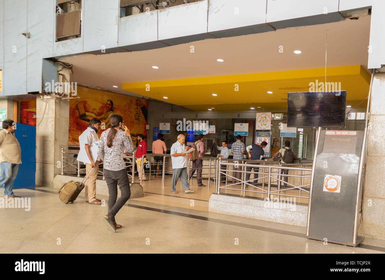 Bangalore India - June 3, 2019: Unidentified people at ticket counter to buy tickets at Bangalore railway station. Stock Photo