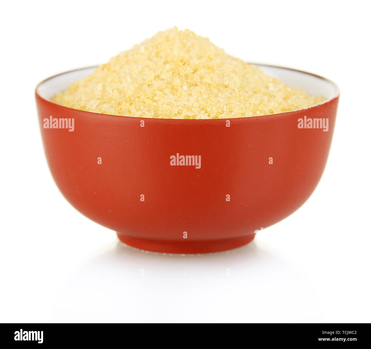 Crystals of gelatin in a bowl isolated on white closeup Stock Photo