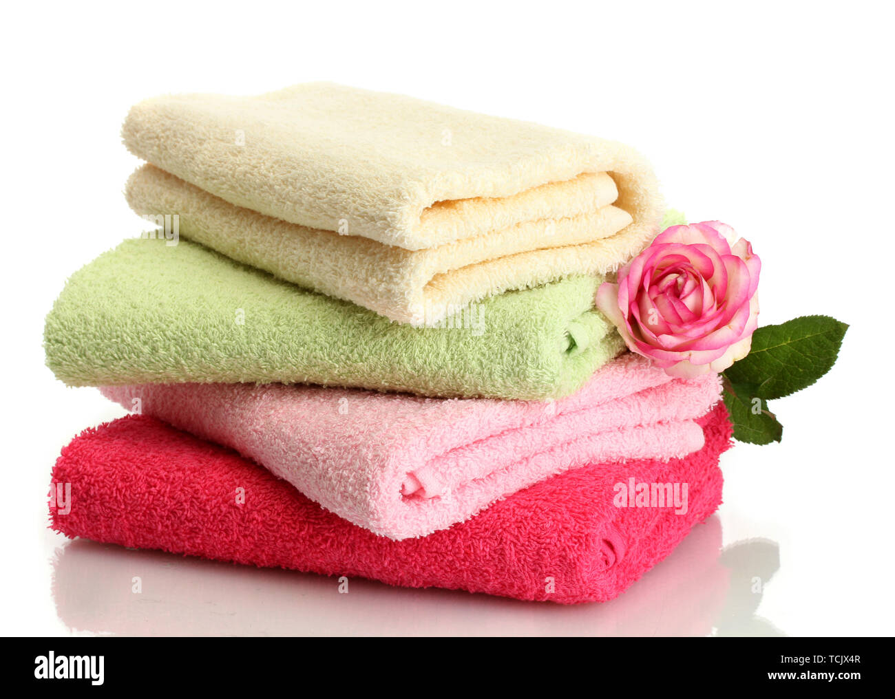bright towels and rose isolated on white Stock Photo Alamy