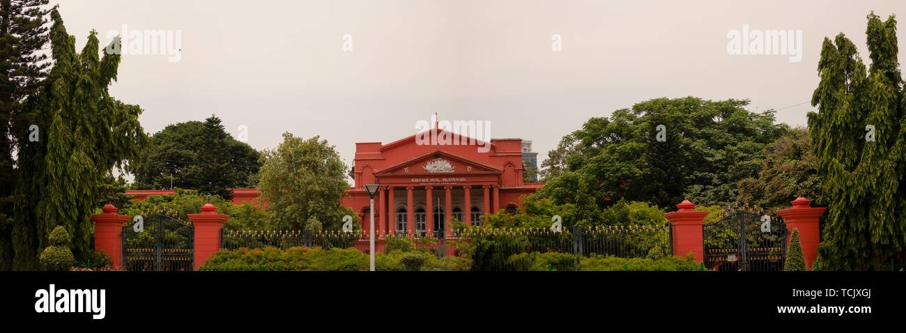 Bangalore India - June 3, 2019: Panoramic view of Karnataka high court covered with green trees. Stock Photo