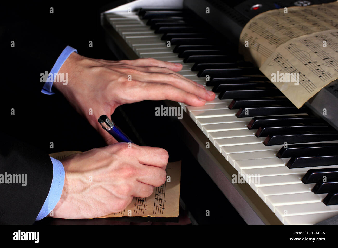 Piano keyboard song music notes hands playing hi-res stock photography ...