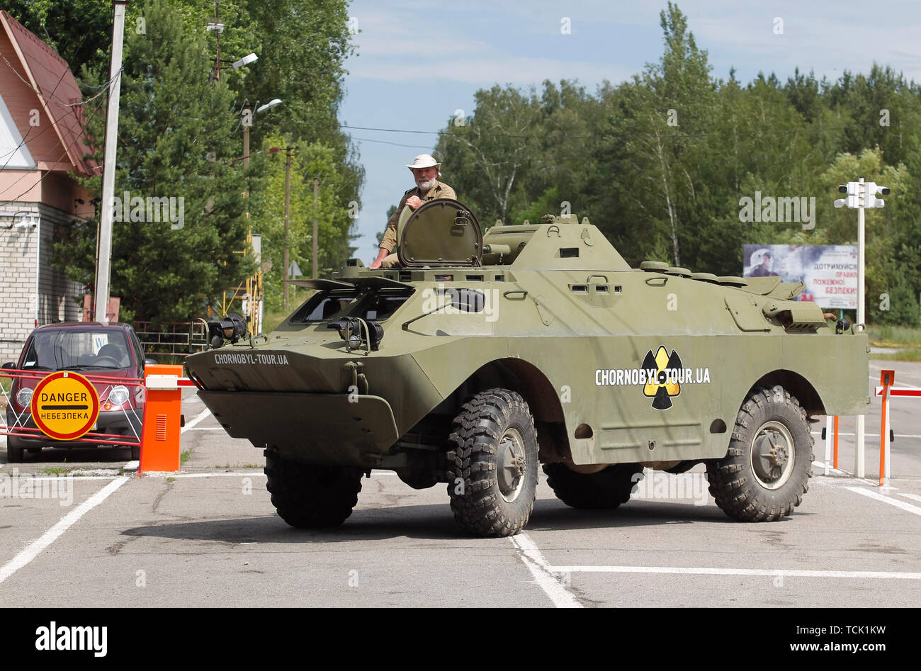 Sergiy Myrnyi, commander of the platoon of radiation intelligence seen on the Dytyatky checkpoint at the Chernobyl exclusion zone in Pripyat. The HBO television miniseries Chernobyl, premiered in U.S. and England on May 2019, depicts the disaster's aftermath, including the clean-up operation and subsequent inquiry. The success HBO television miniseries Chernobyl examining the world’s worst nuclear accident at Chernobyl has driven up the number of tourists wanting to see the plant and the ghostly abandoned town that neighbors it for themselves, and to have boosted the region's tourism industry, Stock Photo