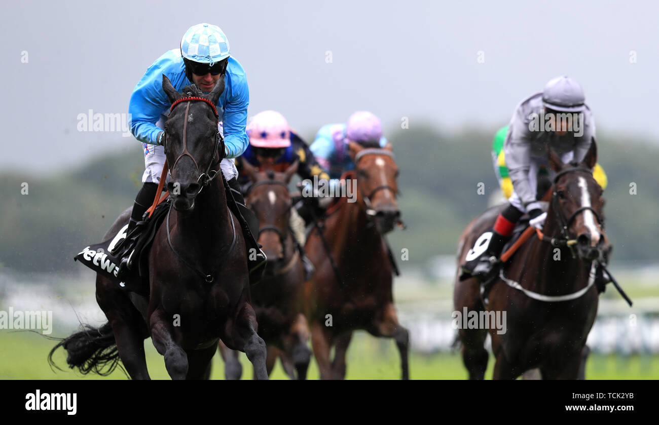 Maid In India ridden by Tom Eaves (left) wins The Betway Achilles Stakes during Betway Sparkling Saturday at Haydock Park Racecourse, Newton-Le-Willows. Stock Photo