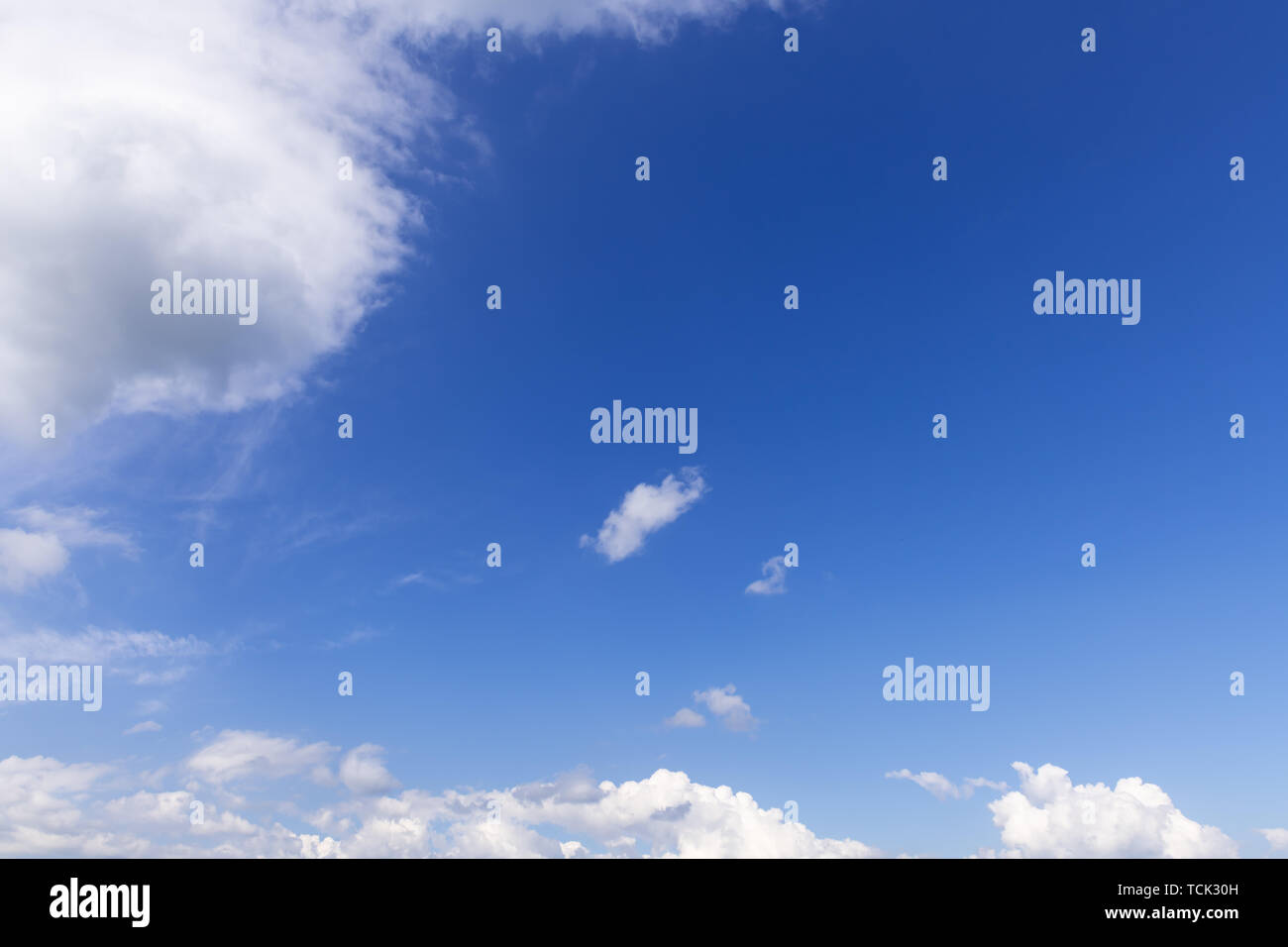 Summer blue sky with soft white clouds background Stock Photo - Alamy