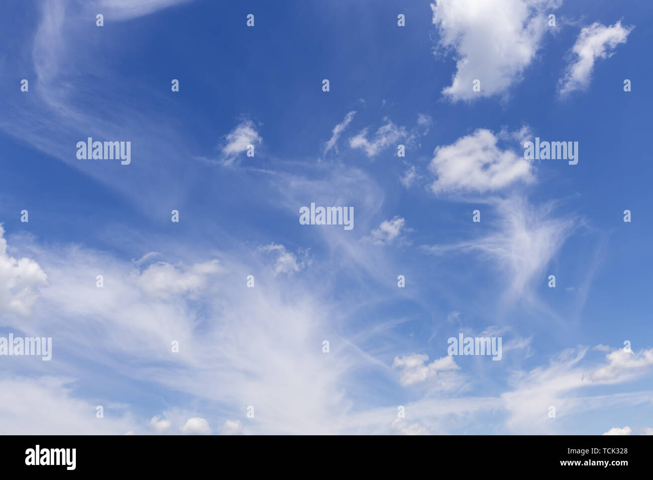 Summer blue sky with soft white clouds background Stock Photo - Alamy