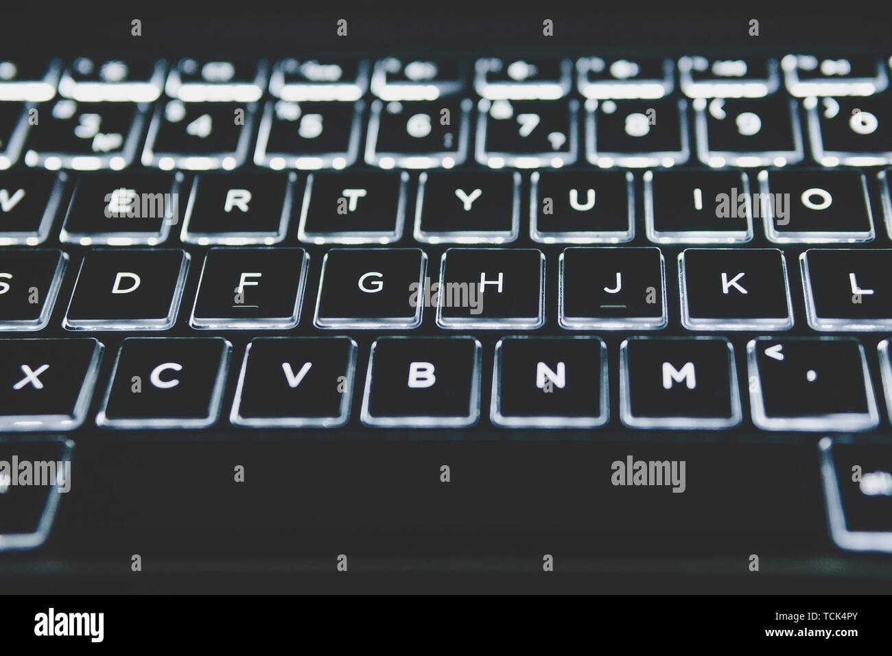 laptop with lit keys laptop with lit keys