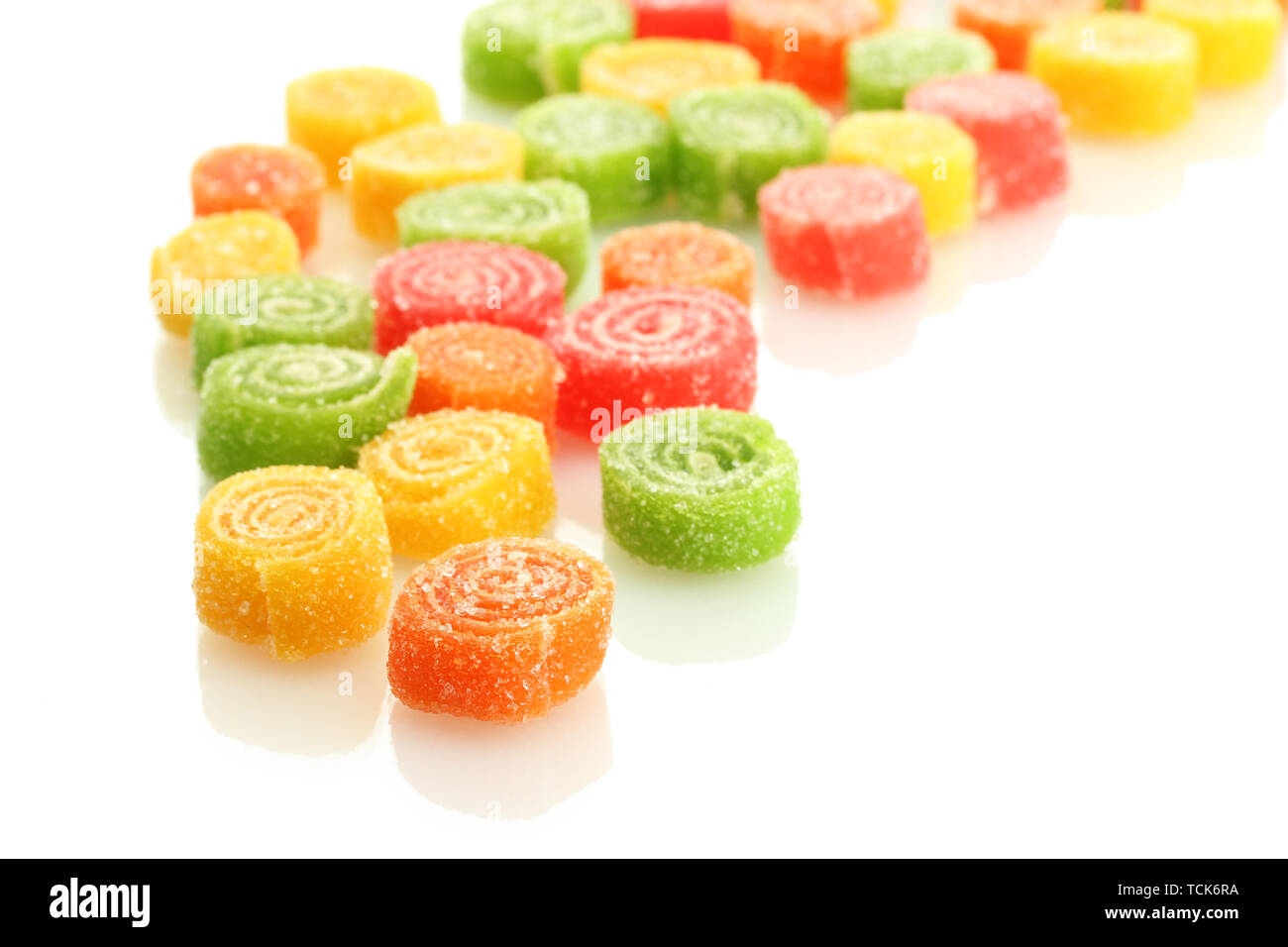 sweet jelly candies isolated on white Stock Photo - Alamy