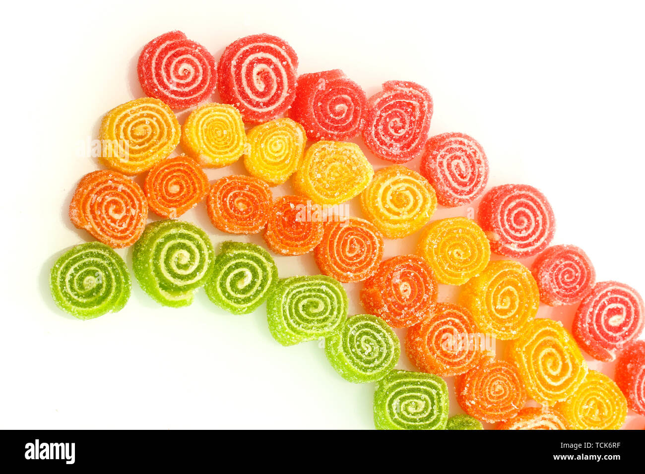 sweet jelly candies isolated on white Stock Photo - Alamy