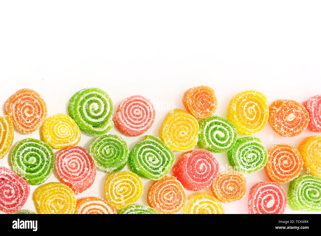 sweet jelly candies isolated on white Stock Photo - Alamy