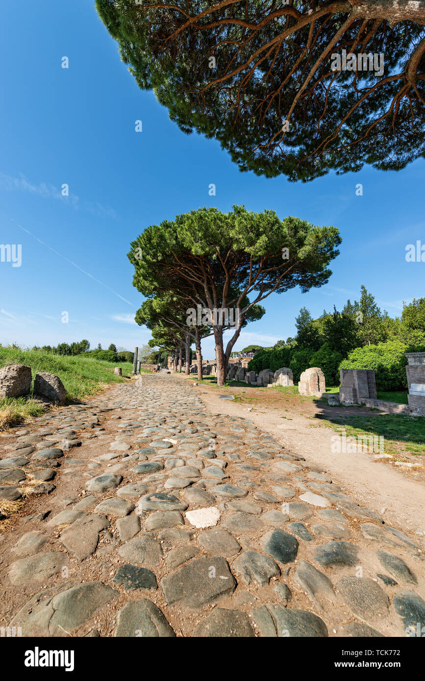 Decumanus Maximus, ancient Roman road in Ostia Antica, Colony founded in the VII century BC. Archeological site in Rome, UNESCO world heritage, Italy Stock Photo
