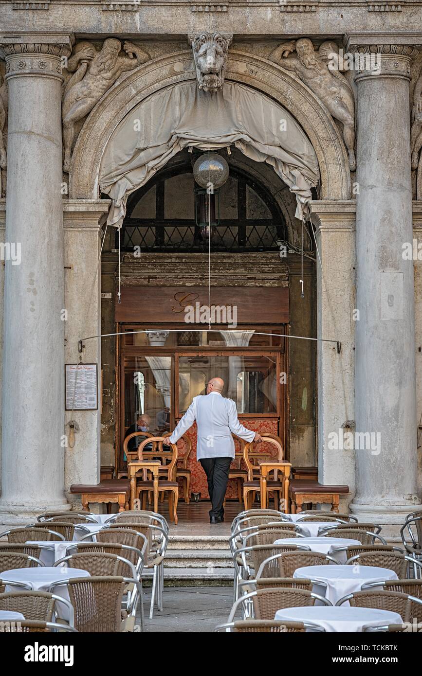 Waiter in a restaurant on St Mark's Square, Venice, Italy Stock Photo