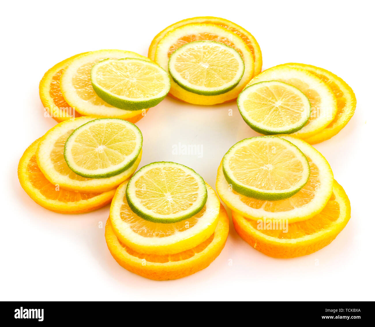 Orange lime and lemon close up isolated on white Stock Photo - Alamy
