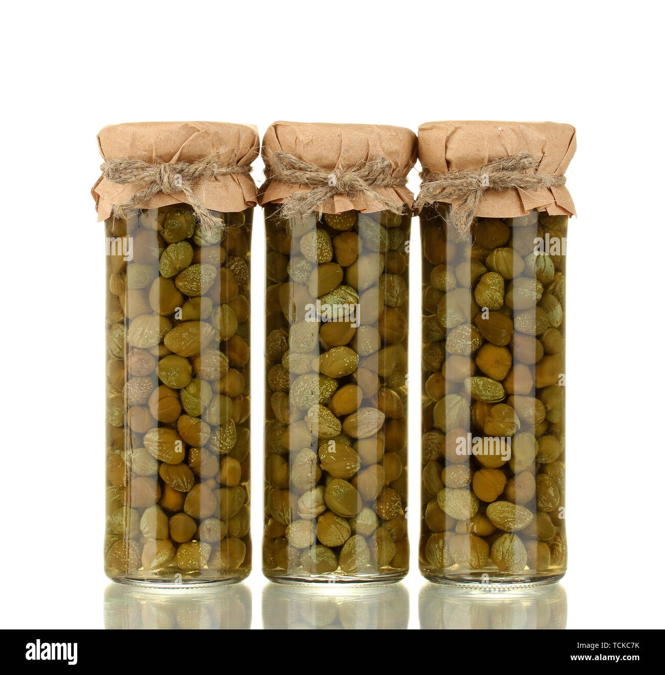 Glass jar with tinned capers isolated on white Stock Photo Alamy