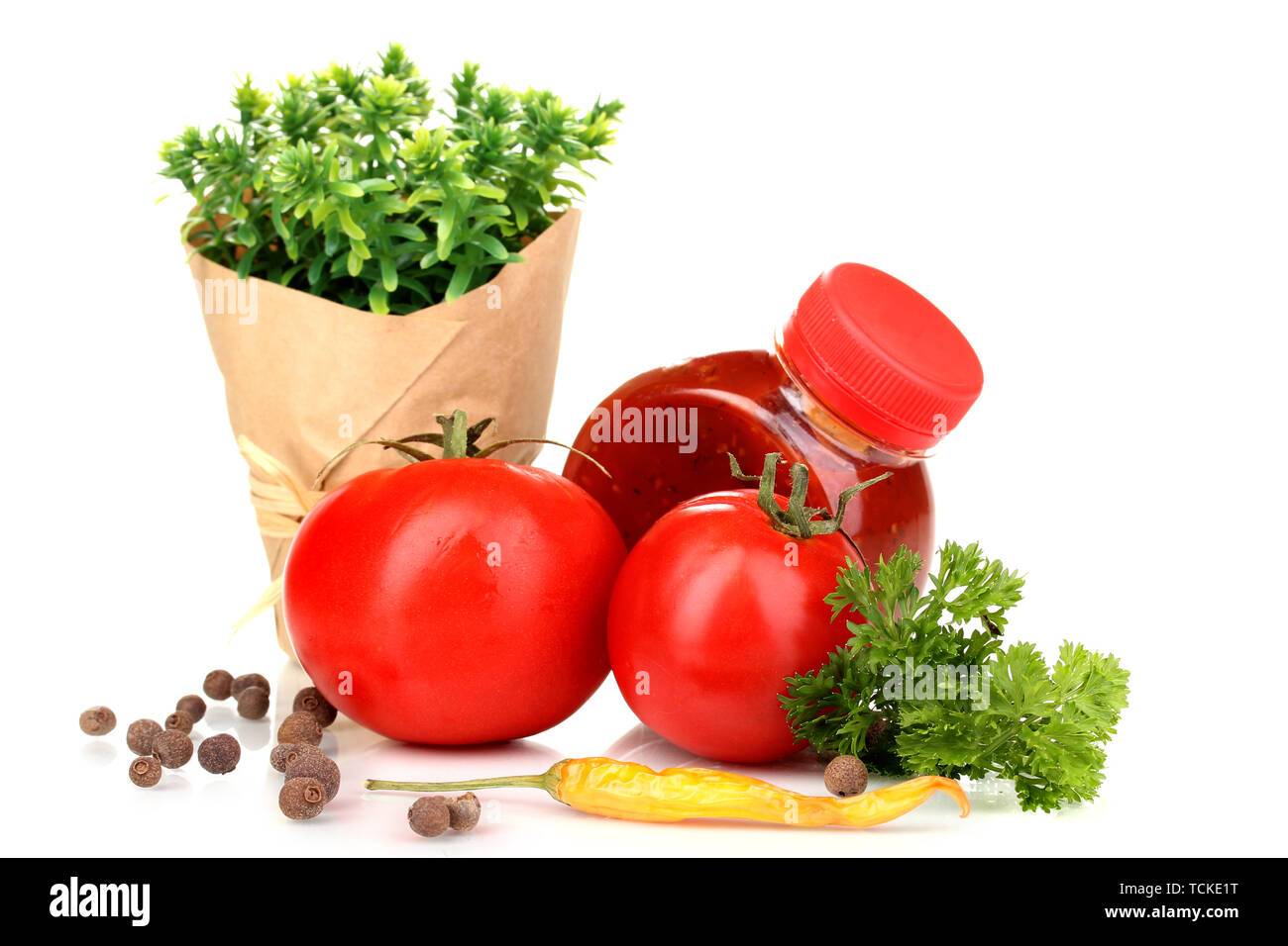 Still life tomatoes ketchup and herbs isolated on white Stock Photo Alamy