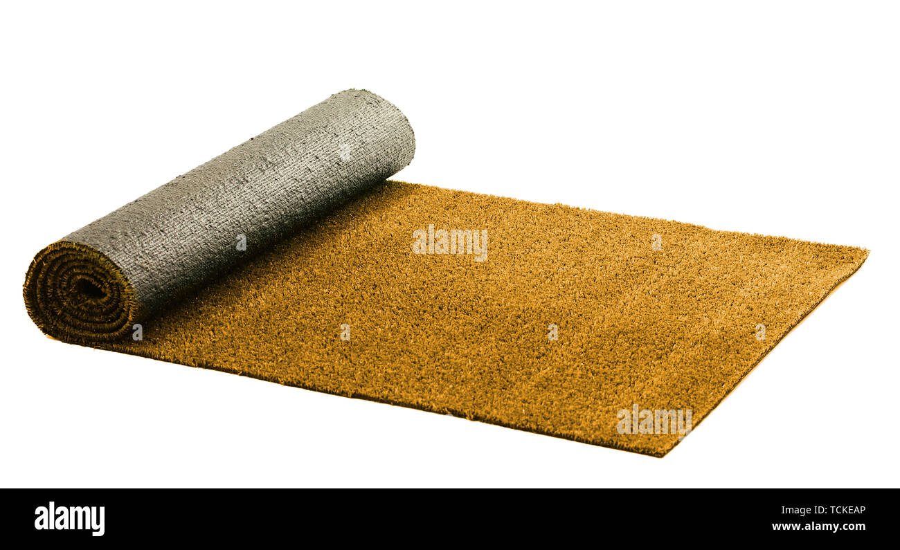 Artificial rolled yellow grass, isolated on white Stock Photo Alamy