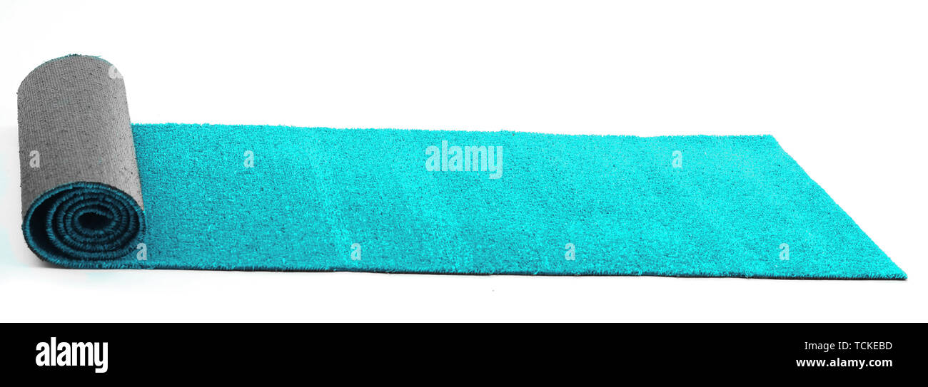 Artificial rolled light blue grass, isolated on white Stock Photo