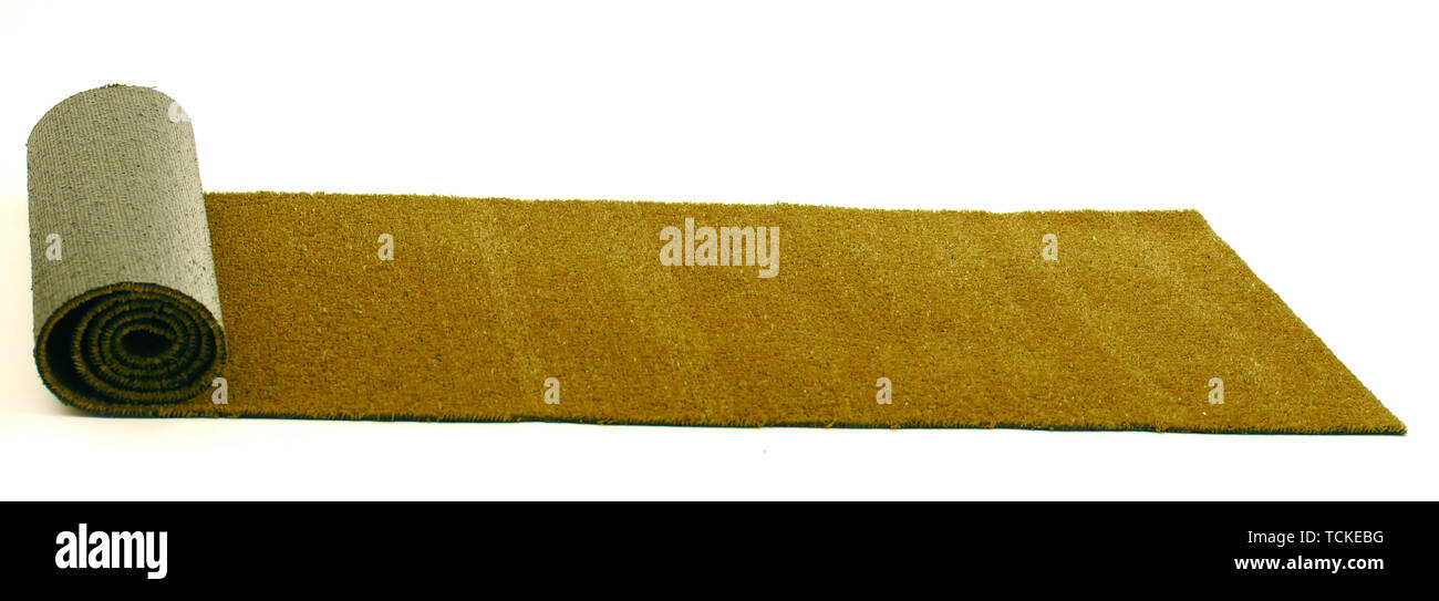 Artificial rolled yellow grass, isolated on white Stock Photo Alamy