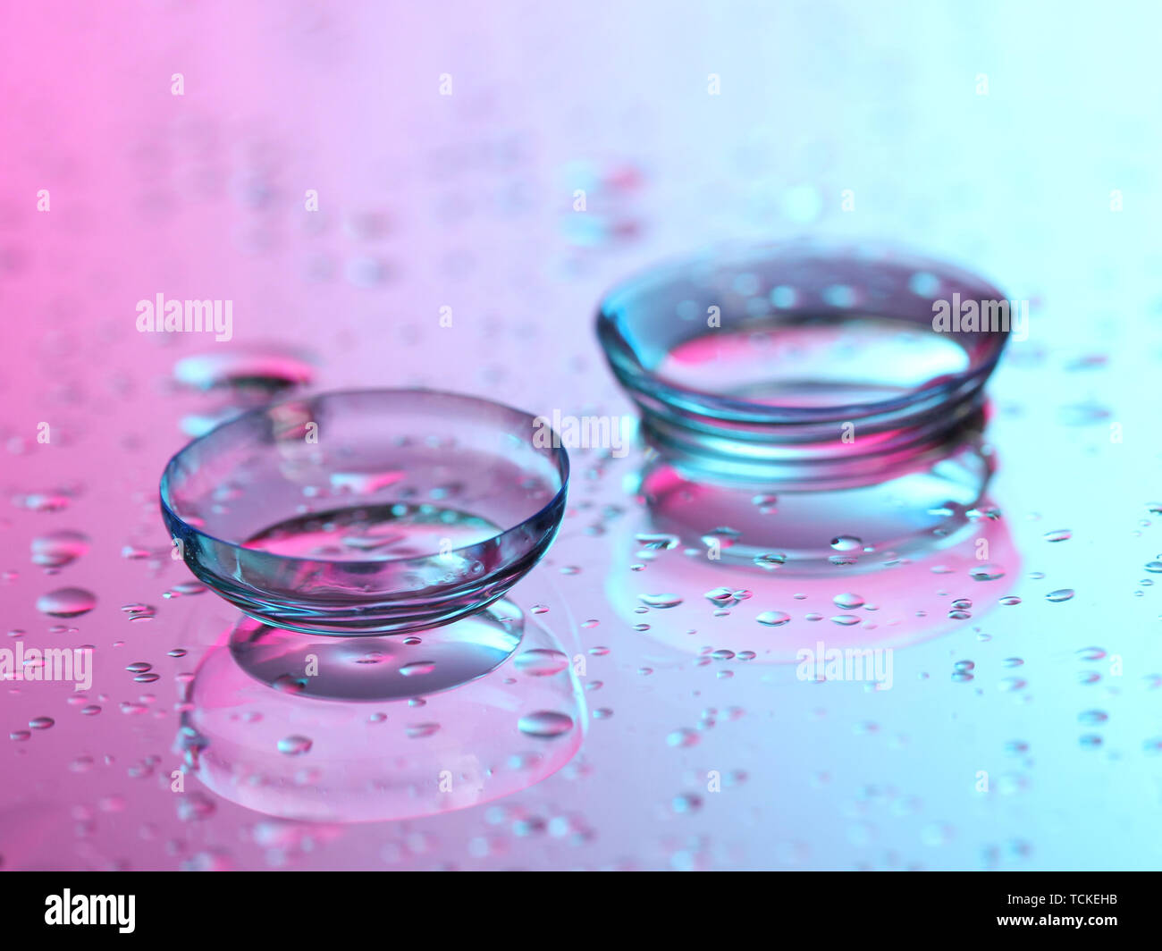 contact lenses, on pink-blue background Stock Photo