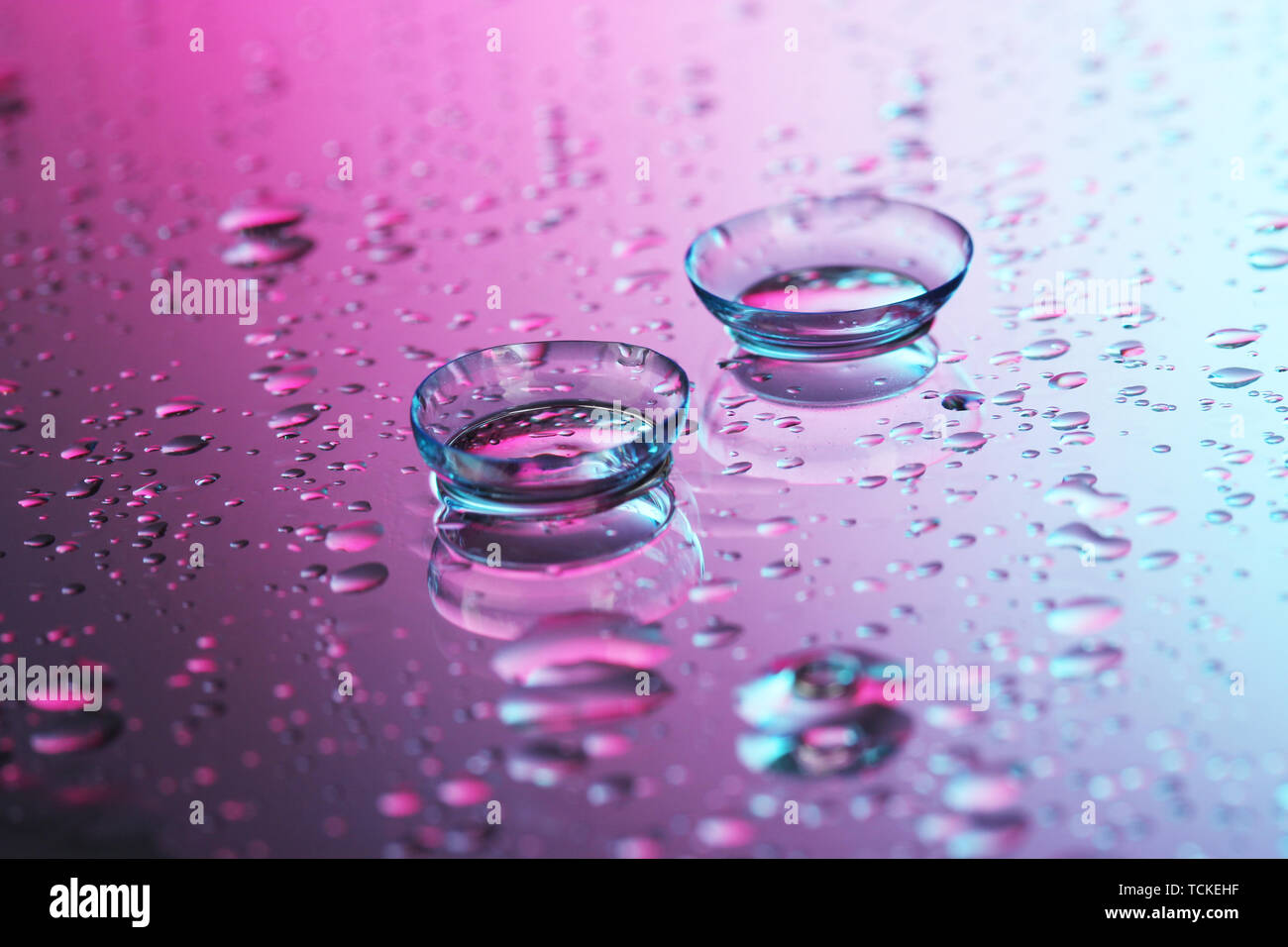 contact lenses, on pink-blue background Stock Photo