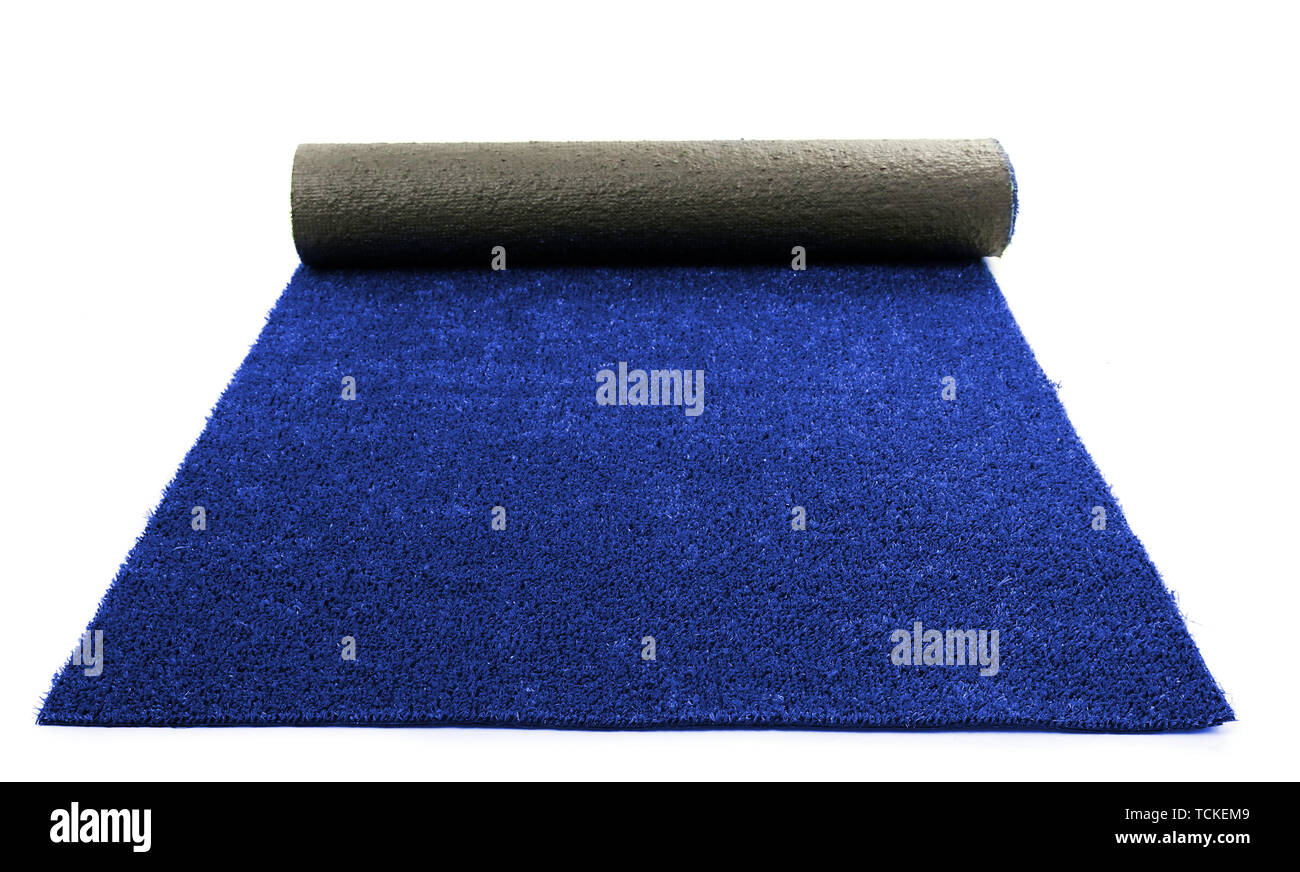 Artificial rolled blue grass, isolated on white Stock Photo