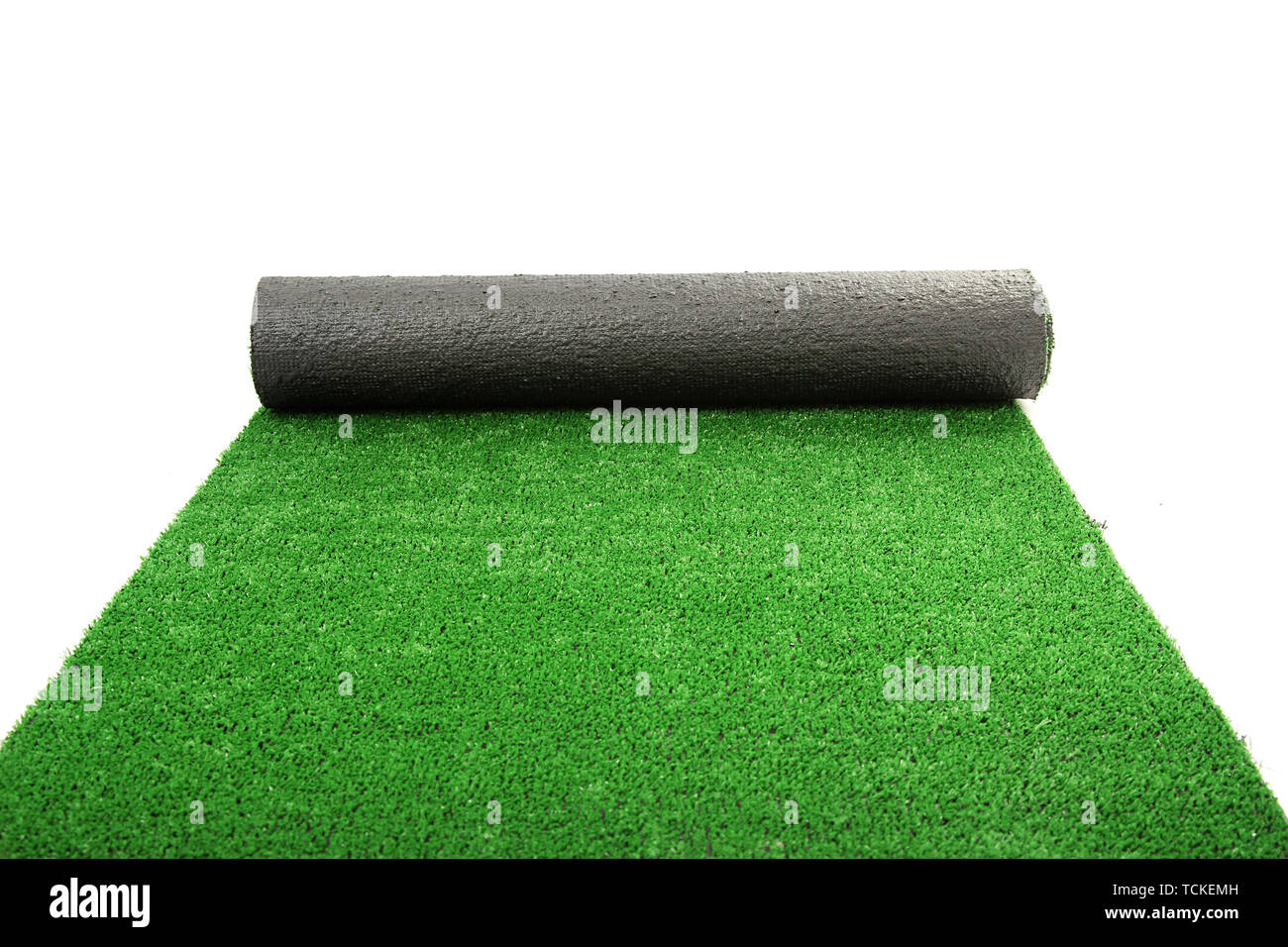 artificial rolled green grass, isolated on white Stock Photo