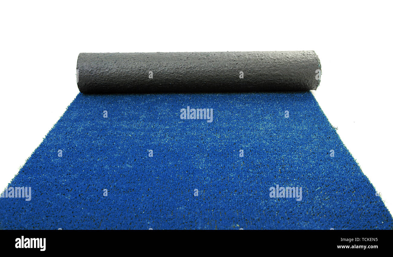 Artificial rolled blue grass, isolated on white Stock Photo