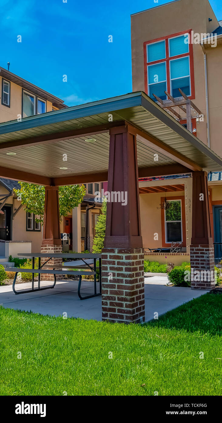 Panorama Patio With Table And Seats Under The A Roof Supported By